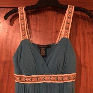 Form fitting and flattering turquoise dress